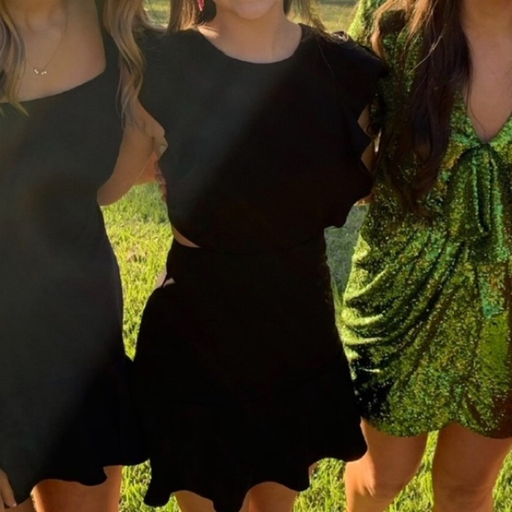 Adorable mini dress with cut outs and ruffle trim on the bottom!! - Picture 4 of 4